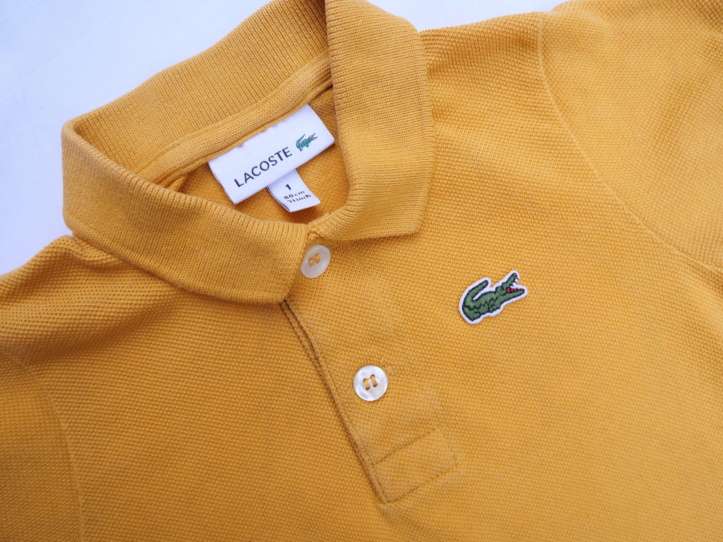 Lacoste - 1 an