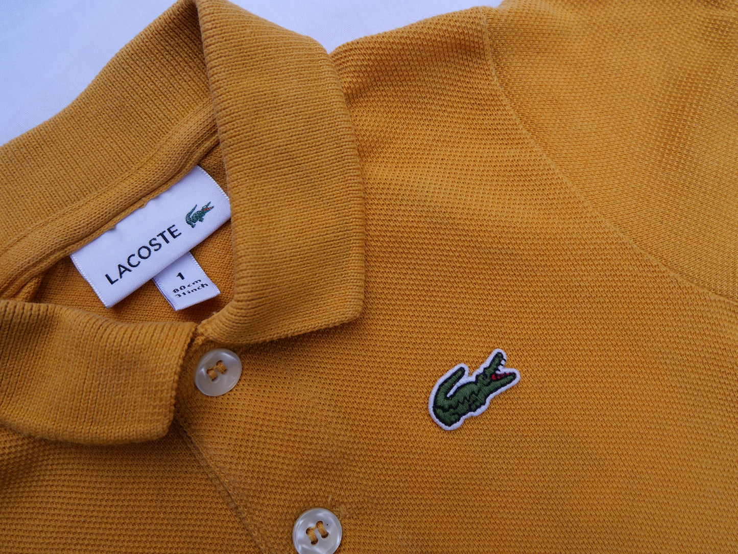 Lacoste - 1 an